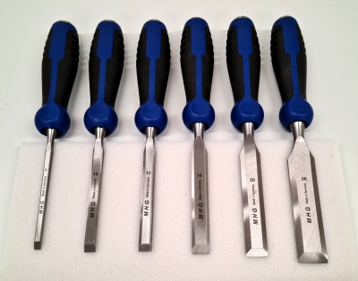 Firmer chisels - set in neutral carton box, 2-part-comp. plastic handle with impact button, polished blade, 3 / 5 / 6 / 7 / 9 / 11 pcs.